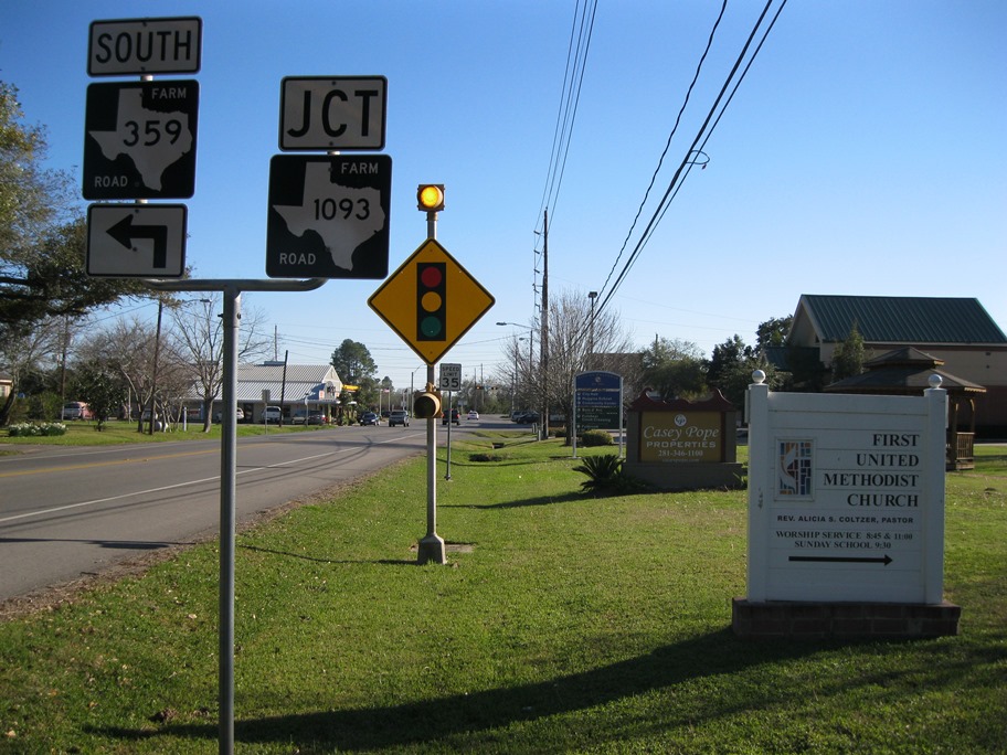 FM 359 in Fulshear, looking south toward the traffic light at FM 1093, photographed February 17, 2013. The photo shows the highway, not drainage construction.